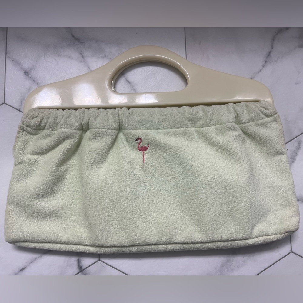 Ollie and Nic flamingo clutch in light mint green with flamingo embroidery